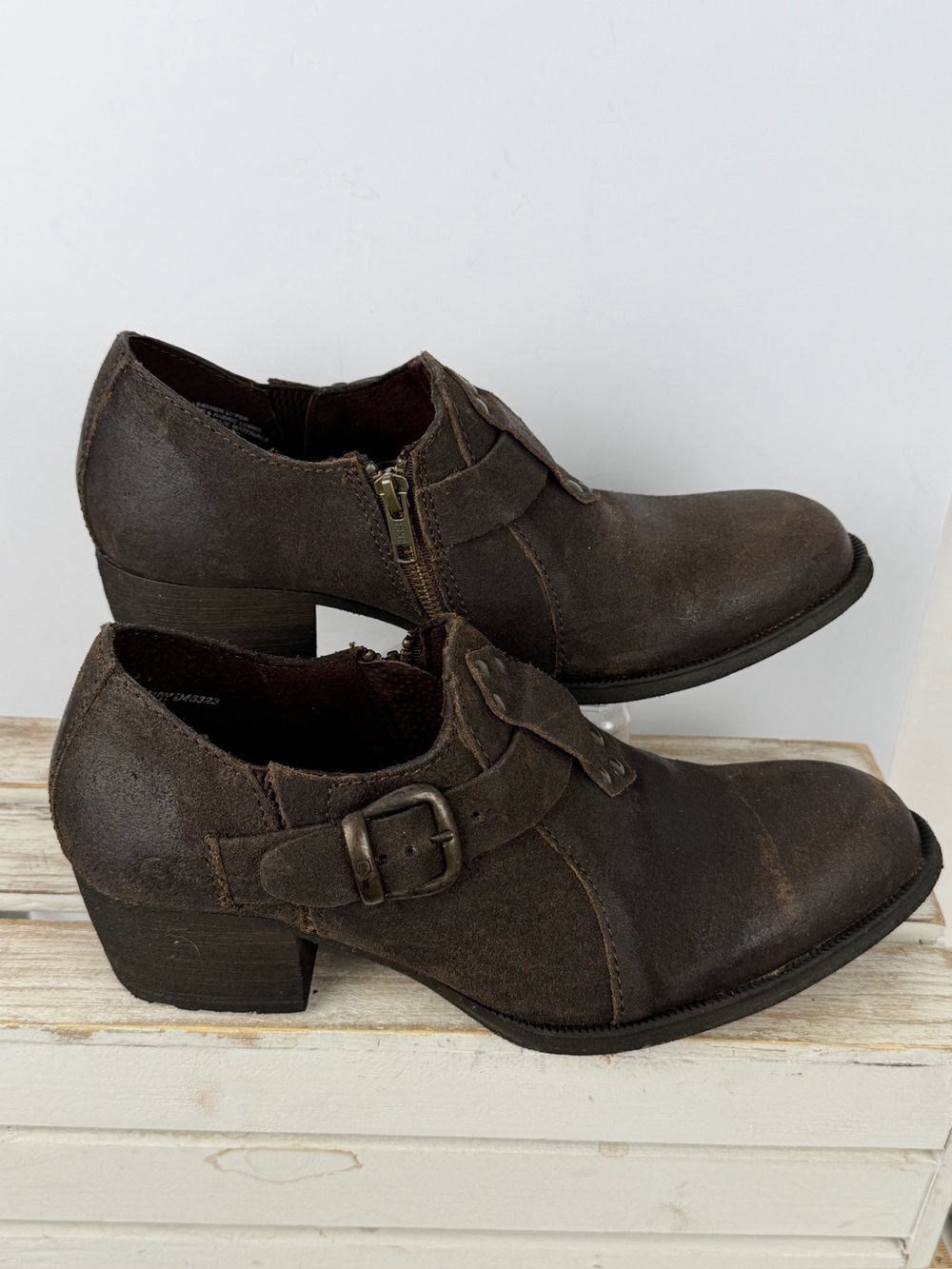Born brown leather ankle booties featuring buckle and stud details Sz 10/42 M/W